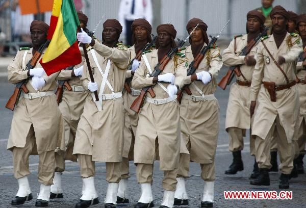 African soldiers march during the France&apos;s Bastille Day military parade held in Paris, capital of France, on July 14, 2010. French President Nicolas Sarkozy and leaders from 13 African countries attended the military parade marking France&apos;s Bastille Day on July 14. [Zhang Yuwei/Xinhua]