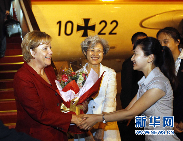 German Chancellor Angela Merkel (L) arrived in Beijing Thursday night, starting a four-day official visit to China.