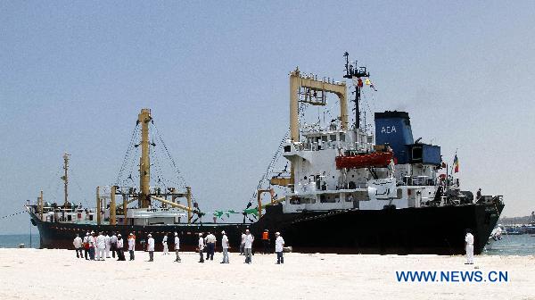 Libyan ship Al-Amal (Hope) arrives at El-Arish port, about 360 kilometers northeast of Cairo, capital of Egypt, on July 15, 2010. The Gaza-bound Libyan aid ship Al-Amal arrived at Egypt&apos;s el-Arish port on Thursday. On Tuesday, organizers of the Libyan-commissioned aid ship said Israeli naval forces have intercepted the ship, ordering it to head to Egypt. [Nasser Nouri/Xinhua]