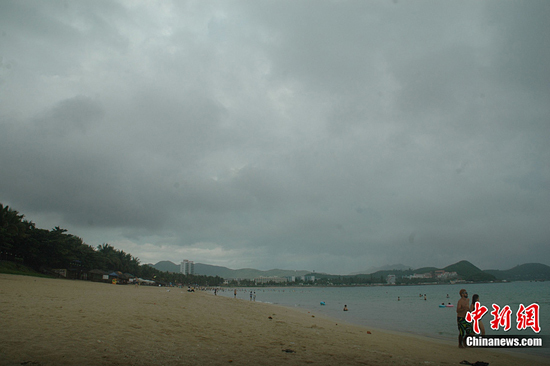 Thick clouds shroud the sky in Sanya, south China's Hainan Province, on July 15, 2010. 