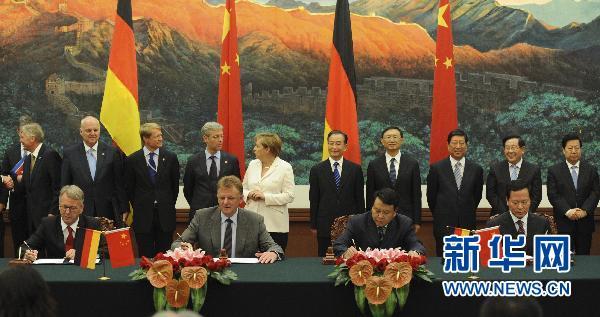 China and Germany inked ten cooperation agreements in Beijing on Friday ranging from green energy, culture to the establishment of joint venture on truck and lorries production.