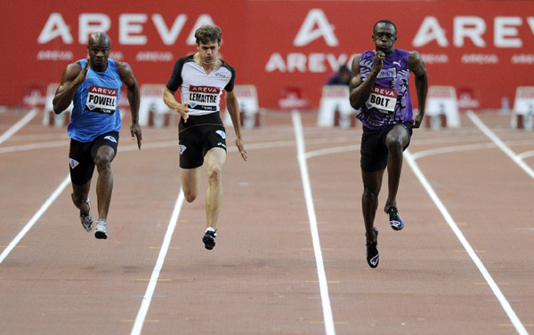 (L to R) Asafa Powell of Jamaica, Christophe Lemaitre of France and Usain Bolt of Jamaica compete in the men&apos;s 100 meters at the IAAF Diamond League athletics meeting at the Stade de France Stadium in Saint-Denis, near Paris July 16, 2010. [Xinhua]