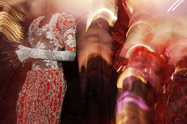 Models wearing creations by Senegalese designer Eva Gabarra wait in line to walk the runway during Dakar Fashion Week, July 16, 2010. [Xinhua] 