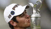 Louis Oosthuizen of South Africa kisses the Claret Jug after winning the British Open golf championship on the Old Course in St. Andrews, Scotland, July 18, 2010.