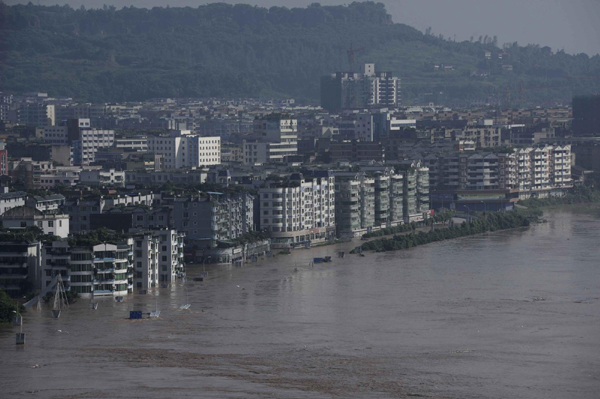 An aerial photo taken on July 19, 2010 shows the flood-stricken Guang&apos;an, Southwest China&apos;s Sichuan province. The most severe flood since 1847 hit the city, with more than 250,000 people affected. [Xinhua] 