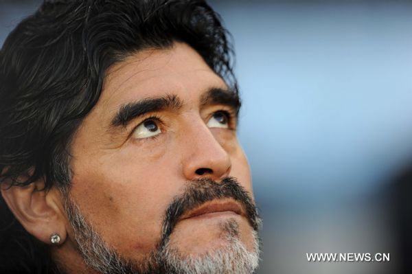 Argentina's head coach Diego Maradona reacts during the 2010 World Cup quarter-final soccer match against Germany at Green Point stadium in Cape Town, South Africa, on July 3, 2010.Germany won 4-0 and is qualified for the semi-finals. (Xinhua/Chen Haitong) (dl) 