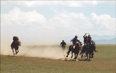 Local herdsmen showcase the prowess of their horses on the Bayanbulak grasslands in Xinjiang.