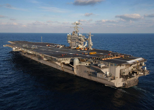 The US made an apparent climb-down on its naval drill plans by deploying its aircraft carrier, USS George Washington, in the Sea of Japan, instead of in the Yellow Sea west of South Korea, following objections from China.