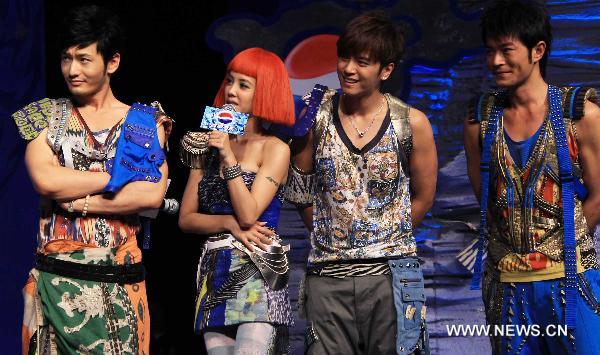 Pepsi stars Huang Xiaoming, Jolin Tsai, Show Luo and Louis Koo (L-R) attend the premiere of Pepsi's new advertisement in Beijing, on July 21, 2010.