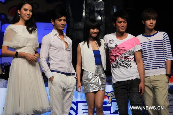 Miss World 2007 Zhang Zilin and Pepsi stars Huang Xiaoming, Jolin Tsai, Louis Koo and Show Luo (L-R) attend the premiere of Pepsi's new advertisement in Beijing, on July 21, 2010.