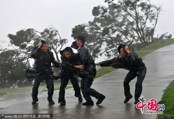Chanthu, the third typhoon of the season, made landfall at the coastal area of Wuchuan City, South China&apos;s Guangdong Province, at around 1:45 pm Thursday, with winds near its center at 126 km per hour. [Photo/Xinhua]