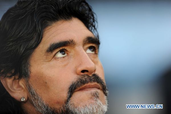 Argentina's head coach Diego Maradona reacts during the 2010 World Cup quarter-final soccer match against Germany at Green Point stadium in Cape Town, South Africa, on July 3, 2010.Germany won 4-0 and is qualified for the semi-finals. (Xinhua/Chen Haitong) (dl) 