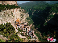 Daluo Palace is a large-scale, thirteen-story Taoist architectural complex on Mianshan Mountain in Jiexiu City of the central Shanxi Province. It boasts to be the highest immortal realm of Daoism and the biggest Daoist temple in China. [China.org.cn]