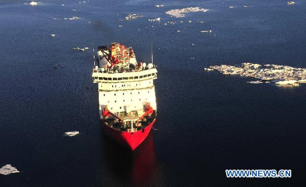 Photo taken on July 26, 2010 on Dolphin Helicopter shows China's icebreaker 'Xue Long', or 'Snow Dragon', sailing in the Arctic Ocean at 72 degrees of north latitude and 154 degrees of west longitude. 