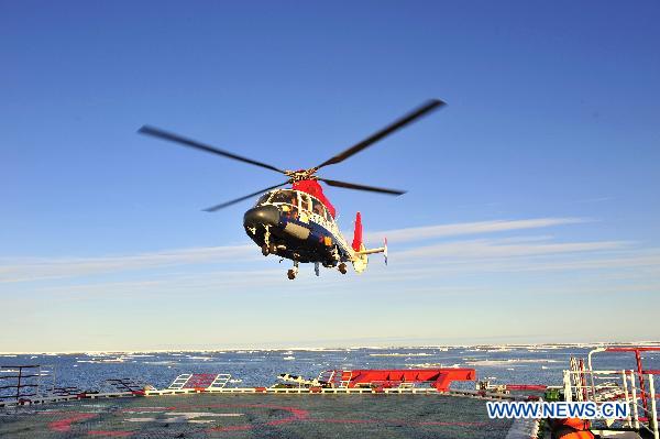 The Dolphin Helicopter takes off from China's icebreaker 'Xue Long', or 'Snow Dragon', in the Arctic Ocean at 72 degrees of north latitude and 154 degrees of west longitude, July 26, 2010.