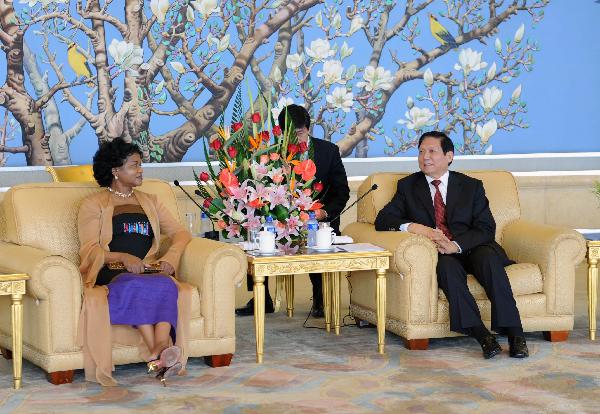 Liu Qi(R1), a member of the Political Bureau of the Central Committee of the Communist Party of China (CPC) and secretary of the CPC Beijing Municipal Committee, meets with chairperson of South Africa's African National Congress (ANC) Baleka Mbete in Beijing, capital of China, July 28, 2010. [Li Tao/Xinhua]