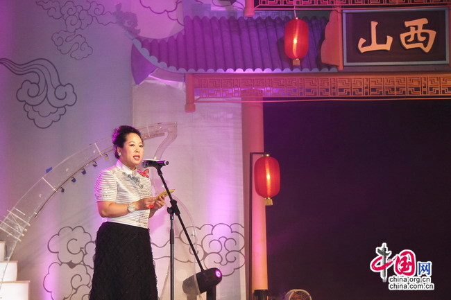 Vice president of Star River Property Holding Limited Liang Shangyan speaks at the opening ceremony of 'Splendid Asia, Beautiful Shanxi' Asian Fashion Show in Star River Hotel in Taiyuan, capital of north China's Shanxi Province, July 24, 2010.