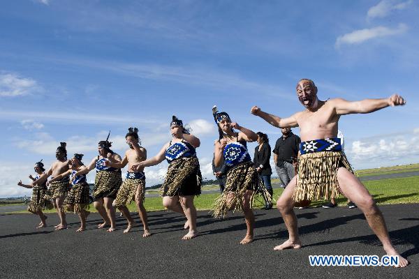 Dancers show the Maori cultural performance during the flame arrival ceremony at the airport in Auckland, New Zealand, July 31, 2010.The torch for the Singapore 2010 Youth Olympic Games journey arrived in Auckland on Saturday.