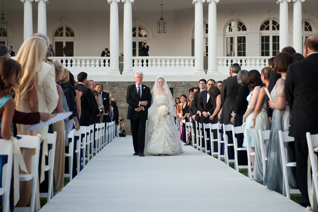 Former U.S. President Bill Clinton Former U.S. President Bill Clinton walks his daughter Chelsea down the aisle during her wedding to Marc Mezvinsky at Astor Court in Rhinebeck, New York July 31, 2010. [Xinhua/AFP]