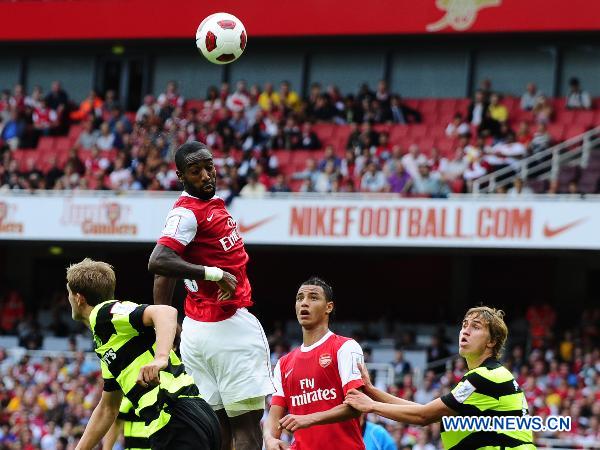 Johan Djourou (above) of Arsenal goes for a header in the second day match between Arsenal and Celtics during the Emirates Cup soccer tournament at the Emirates Stadium, London, Britain, August 1, 2010. (Xinhua/Zeng Yi) 