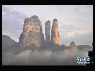 The World Heritage Committee decided to include China Danxia Landform in the World Heritage List at its 34th meeting being held in Brasilia, capital of Brazil, on Aug.1, 2010. The six Danxia landform areas are: Mountain Langshan (Hunan Province), Mountain Danxiashan (Guangdong Province), Taining (Fujian Province), Mountain Longhushan and Guifeng (Jiangxi Province), Chishui (Guizhou Province), Mountain Jianglangshan (Zhejiang Province). [Xinhua]