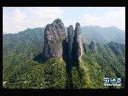 The World Heritage Committee decided to include China Danxia Landform in the World Heritage List at its 34th meeting being held in Brasilia, capital of Brazil, on Aug.1, 2010. The six Danxia landform areas are: Mountain Langshan (Hunan Province), Mountain Danxiashan (Guangdong Province), Taining (Fujian Province), Mountain Longhushan and Guifeng (Jiangxi Province), Chishui (Guizhou Province), Mountain Jianglangshan (Zhejiang Province).  [Xinhua]