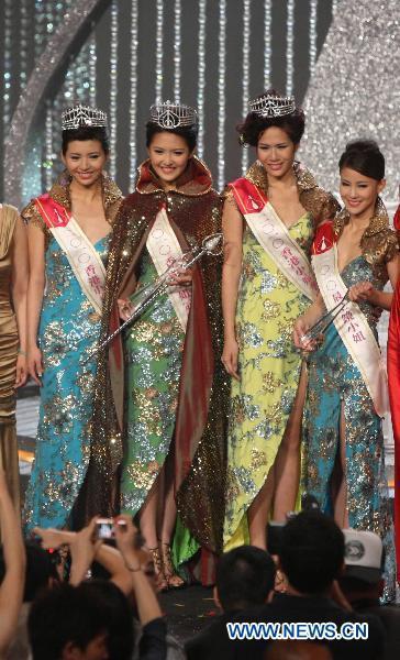 Miss Hong Kong 2010 Toby Chan (2nd L), also crowned Miss International Goodwill 2010, poses with first runner-up Sammi Cheung (1st L), second runner-up Lisa Chong(2nd R) and Most Photogenic Crystal Li(1st R) after winning the annual beauty contest in Hong Kong, south China, Aug. 2, 2010.