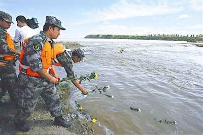Servicemen drown performing duties