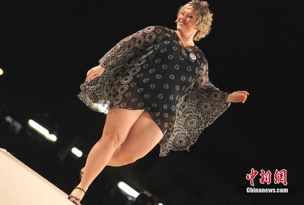 &apos;Miss Chubby&apos; contest is held in the Tuscany village of Forcoli, near the city of Pisa, Italy, July 31, 2010. [chinanews.com]