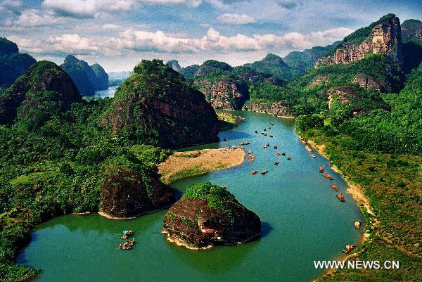 File photo shows scenery of Mountain Longhushan in east China's Jiangxi Province. The World Heritage Committee decided to include China Danxia Landform in the World Heritage List at its 34th meeting being held in Brasilia, capital of Brazil, on Aug. 1, 2010. 