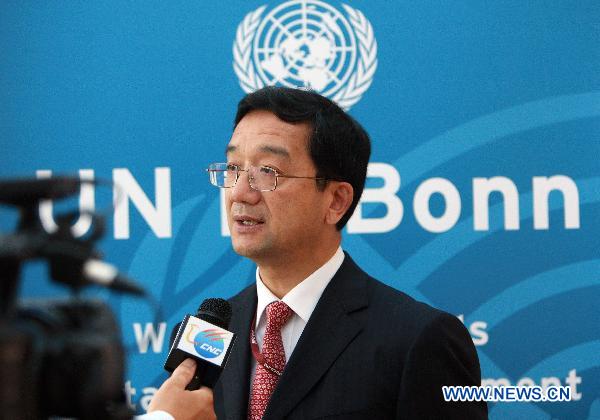 Huang Huikang, special representative for climate change negotiations of China's Foreign Ministry, speaks during an exclusive interview with Xinhua News Agency during the third round of UN climate talks this year in Bonn, Germany, Aug. 2, 2010. The core of the ongoing UN climate talks is that developed countries should take on their historical, legal and moral responsibilities for climate change, Huang said here Monday. [Xinhua] 