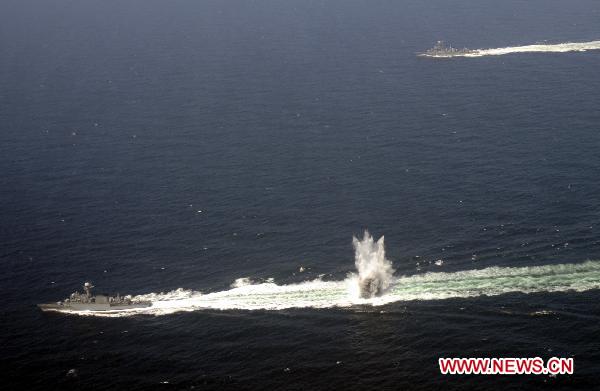 South Korean warships attend an anti-submarine drills in waters off the west coast of the divided Korean peninsula, Aug. 5, 2010. South Korea began on Thursday massive anti-submarine drills in waters off the west coast of the divided Korean peninsula despite a warning from its wartime rival against the exercises that heightened tensions near the western sea border. [Song Kyeongseok/Xinhua]