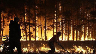 Wildfires rage across Russia