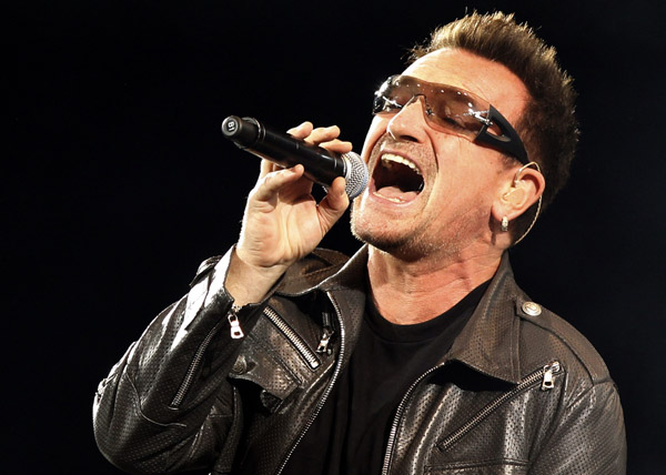 Lead singer Bono of Irish rock band U2 performs a concert at the Olympic stadium in Turin, northern Italy August 6, 2010. U2 singer Bono is ready to rock after back surgery sidelined him for two months, and forced the band to postpone its North American tour by a year to May 2011. The Irish rockers began the second European leg of their &apos;360 Degree&apos; world tour on Friday in Italy.