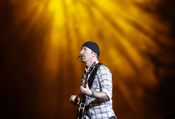 The Edge, guitarist of Irish rock band U2, performs a concert at the Olympic stadium in Turin, northern Italy August 6, 2010. U2 singer Bono is ready to rock after back surgery sidelined him for two months, and forced the band to postpone its North American tour by a year to May 2011. The Irish rockers began the second European leg of their &apos;360 Degree&apos; world tour on Friday in Italy.