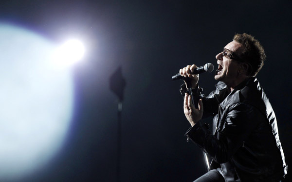  Lead singer Bono of Irish rock band U2 performs a concert at the Olympic stadium in Turin, northern Italy August 6, 2010. U2 singer Bono is ready to rock after back surgery sidelined him for two months, and forced the band to postpone its North American tour by a year to May 2011. The Irish rockers began the second European leg of their &apos;360 Degree&apos; world tour on Friday in Italy. 