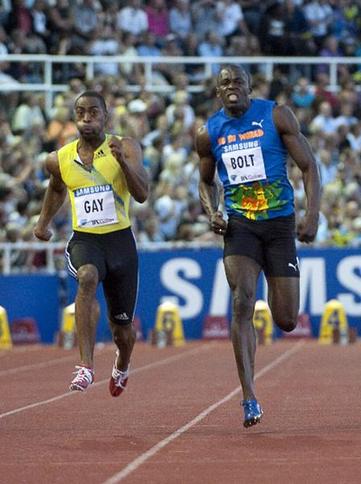 Tyson Gay of the U.S., left, wins the men's 100m ahead of Jamaica's Usain Bolt, right, at the IAAF Diamond League 'DN Galan' at the Stockholm Olympic Stadium in Stockholm, Sweden, Friday Aug. 6, 2010. [Xinhua/AFP]