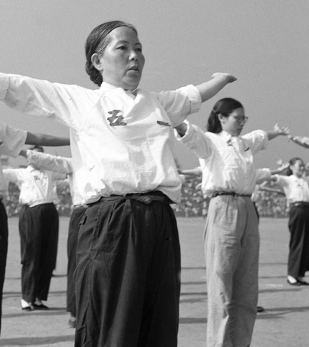 Local residents perform radio gymnastic exercises at a civilian sports meeting in North China&apos;s Shanxi province in this file photo taken on Aug 18, 1958. [Xinhua] 