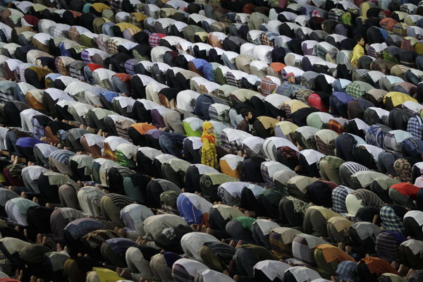 Muslims attend prayers marking the start of Ramadan