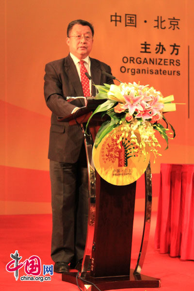 The photo shows Qie Jianwei, deputy head of State Administration of Grain, addressing at the China-Africa Agricultural Forum held in Beijing on August 11, 2010. [Xu Lin / China.org.cn] 