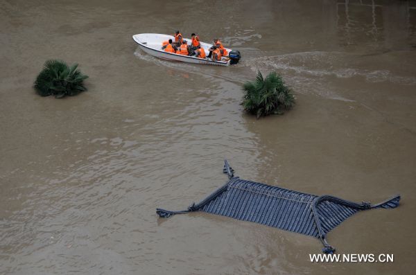 Photo taken on Aug. 13, 2010 shows the scene of the ponding area in landslide-hit Zhouqu County, Gannan Tibetan Autonomous Prefecture in northwest China's Gansu Province. Over 80 multi-storeyed buildings are still in seriously ponding area, with water depth of 3-5 meters at present.