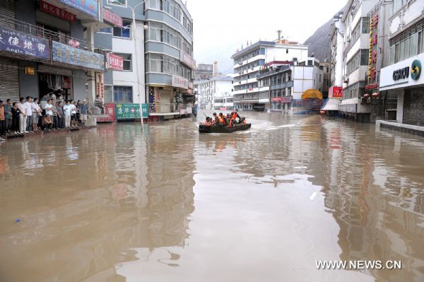 Photo taken on Aug. 13, 2010 shows the scene of the ponding area in landslide-hit Zhouqu County, Gannan Tibetan Autonomous Prefecture in northwest China's Gansu Province. Over 80 multi-storeyed buildings are still in seriously ponding area, with water depth of 3-5 meters at present.