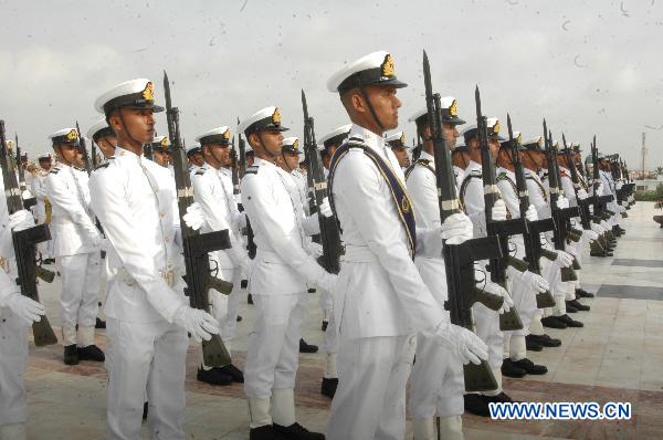 Pakistani navy soldiers march at the mausoleum of Quaid-e-Azam to mark the 64th Independence Day in Karachi Aug. 14, 2010. The government and the people in Pakistan have decided to keep the 64th Independence Day celebrations low profile and simple on Saturday to keep the focus on rescue and relief activities amid the country's worst-ever floods. [Xinhua] 