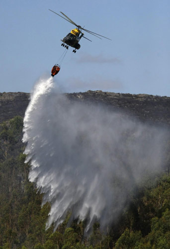 Spain, Portugal fight 19 large wildfires