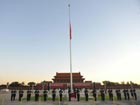Tian'Anmen Square: Flags at half-mast for mudslide victims