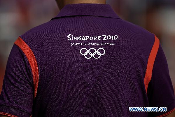 A staff member works at Bishan Stadium of the Singapore 2010 Youth Olympic Games in Singapore, August 18, 2010. [Xinhua]