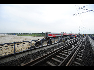 The damaged passenger train and railway are seen in this photo taken on August 19, 2010.[Xinhua]