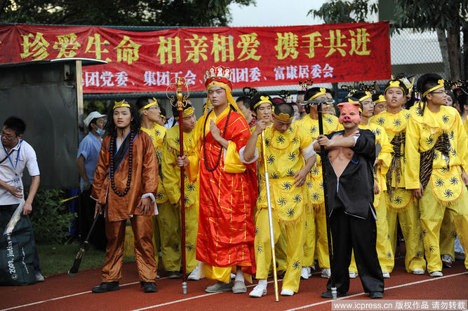Workers of Foxconn Technology Group, the world's largest electronics contractor, attend a rally held by the company at its Shenzhen complex on August 18, 2010 in Shenzhen, Guangdong Province of China.