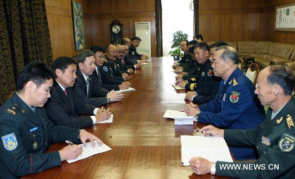 Mongolian Prime Minister Sukhbaatar Batbold (2nd L) meets with Ma Xiaotian (2nd R), deputy chief of the General Staff of the Chinese People's Liberation Army, in Ulan Bator Aug. 19, 2010. [A Sigang/Xinhua]
