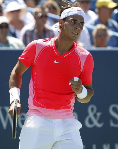 Nadal of Spain pumps his first after winning first set against Dent of the U.S. during Cincinnati Masters tennis tournament Rafael Nadal of Spain pumps his first after winning the first set against Taylor Dent of the U.S. during their second round match at the Cincinnati Masters tennis tournament in Cincinnati, August 18, 2010. (Xinhua/Reuters)